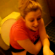 Some girls just moved into their new apartment. While one girl is filming the new place to document the important day, another girl is taking a shit on the toilet.
